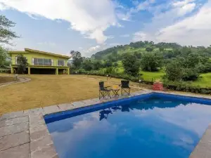 StayVista's Shivom Villa 1 - A Serene Escape with Views of the Valley and Lake