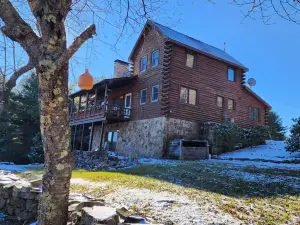 5 BR 3 Full Bath Log Home on 120 acres that sleeps10. Read description