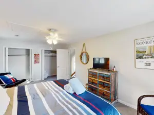 Waterfront home with the largest private beach on the lake, hot tub, & dock