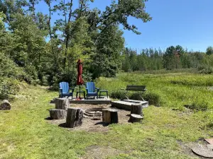 Secluded Waterfront Cabin on hiking trails! Lake on one side river on the other.