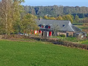 Half-timbered and brick farmhouse dating from 1819, 250 m from the Ardennes forest.