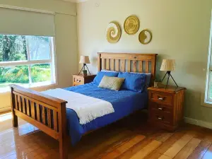 Cottage on orchard acreage with ocean views