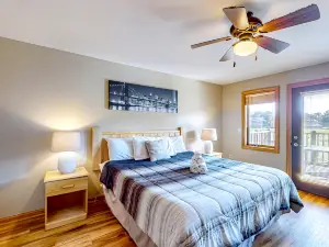 Golf course-front condo with pool, hot tub, dock, tennis, golf, & private beach