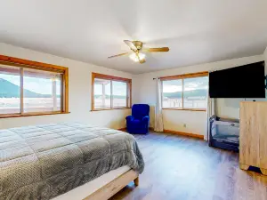 Mountain-view home with large deck, patio, grill, wood fireplace, W/D, & AC