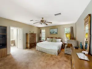 Inviting home with pool, patio, grill, full kitchen, central AC, & W/D
