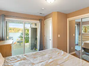 Charming dog-friendly lake retreat with fire pit, patio, dock, & amazing views