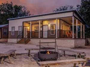 Tranquil Lakefront Retreat: 1BR Cabin with Covered Patio & Private Dock