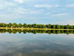Lakeside Sunsets at this 3-bedroom lake cottage that sleeps 12 on Secord Lake.