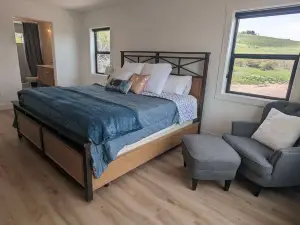 Built 2023!180-degree lake views, huge deck, 6+ acres, fiber, ping pong!
