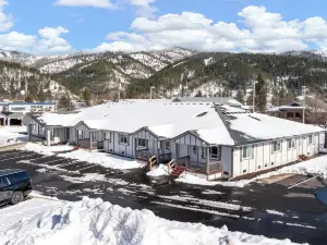 Silverstrike Condos Spacious with Covered Porch and Central Walkable Location.