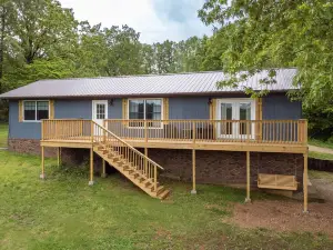 Brand New Farmhouse Style Listing with views of the beautiful Spring River!