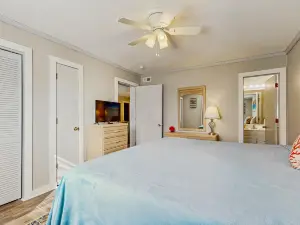 Updated condo with outdoor pool, easy beach access, & private balcony