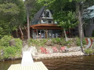Gorgeous Sacheen Lake Villa with Panoramic views of lake from deck w/hot tub!