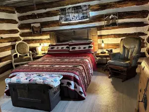 Rustic Log Cabin on private land, with ample gravel roads for horses and ATV’s.