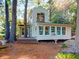 Lakefront Studio in the Trees with Gorgeous Views, Balcony, & Shared Canoe
