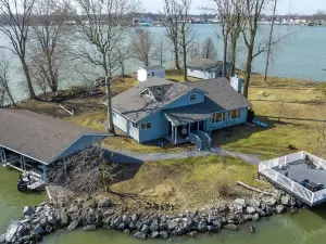 Private Island! Includes house, cottage, boat docks, best sunsets on Indian Lake