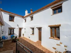 Family House with Farm the Curious