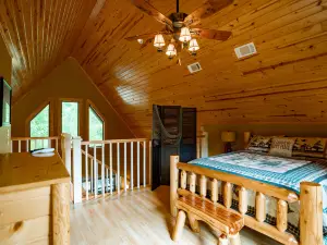 Expansive Deck and Private Dock on River - Picturesque Cabin Retreat