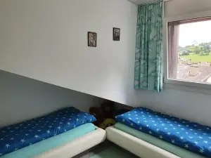 Two-Bedroom Apartment for 4-5 Guests with Lake and Mountain Views