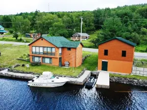 Secluded Waterfront Getaway with Private Deck, Firepit, BBQ