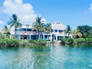 Oceanfront Gated Corner lot Amazing Sunsets. 90” BoatDock & 12 person Swim Spa!