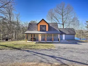 Serene Lakefront Cabin with Deck and Fire Pit!