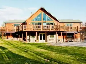 Bring family and friends to this beautiful, spacious, open plan log home.