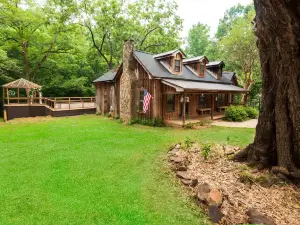 Vintage charm meets modern comfort in this historic 1850s cabin at Lake Hartwell