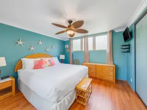 Ocean-view condo with private balcony, washer/dryer, & shared pool/tennis courts