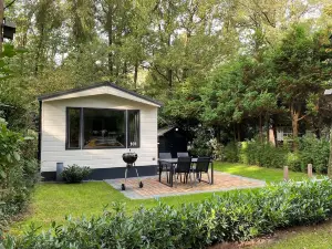 Beautiful Chalet in the Woods with a Shared Pool