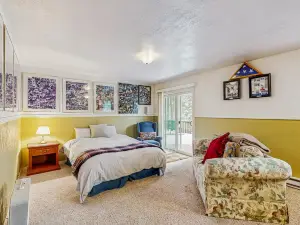 Secluded lake view home with private beach access & game room