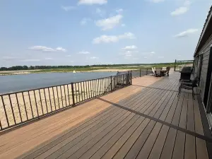 Secluded Elkhorn River Retreat.  Full sized home overlooking 250+ acre lake.