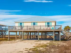 Dog-friendly, water view beach house w/ a full kitchen, furnished deck, & views