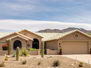 Charming 2-bedroom 2 bath home in Saddlebrooke one with private back yard.