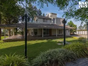 StayVista's Silver Grove - Serene Haven with Expansive Lawn & Terrace