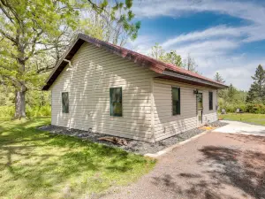 Pet-Friendly Iron River Cabin with Fire Pit!