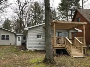 Large waterfront house on quiet canal of all-sport Eight Point Lake