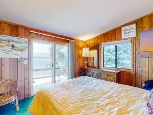 Lakefront home with private beach, dock, firepit, & grill - dazzling sunset view