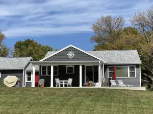 Nautical lakeview home with boat launch across the street from your rental home.