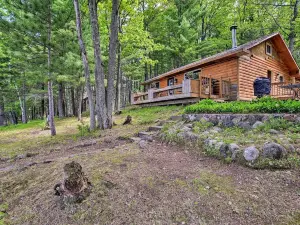 Burns Lake Cabin w/ Dock, Fire Pit, Rowboat & More