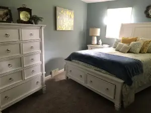 Charming, recently updated country ranch home on quiet, scenic, acre lot.