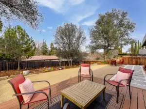 Luxurious 5BR, 3BA home with full kitchen, 2 living rooms, office and yard.