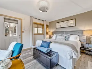 Charming coastal home with water views, large covered deck