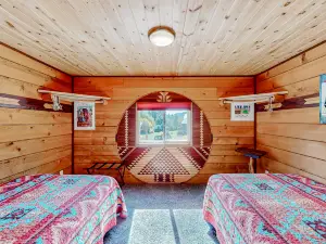 Rustic and secluded cabin with two decks, hot tub, board games, W/D, & AC