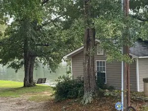 Water Views Everywhere - Lake Front Cottage with Private Dock and Boat Ramp