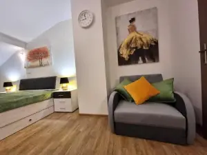 Byt V podkrovi na Velkem namesti