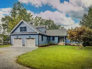 Waterfront home on Pigeon Roost Creek at lake center.  Easy access to main lake.