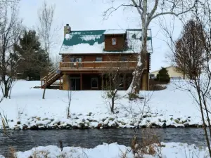 Secluded Riverside Log Home in Southern Michigan