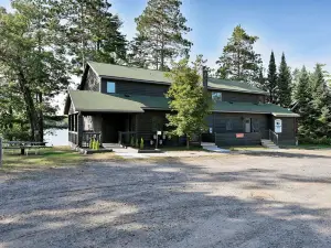 All 4 lakefront condos! Private beach, dock, sauna, club room, decks.