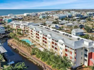 Serene Pool and Canal Views - Charming Coastal Retreat